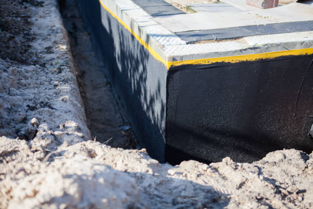 Professional Emergency Waterproofing technician working in Decatur, TN